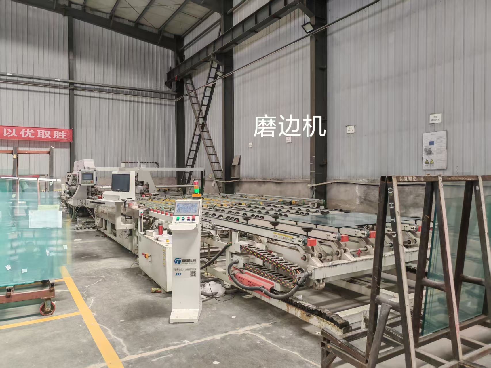 Automated glass edge grinding line inside the factory