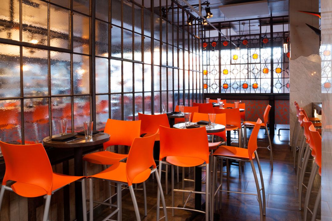 Water-like textured glass partition in a restaurant interior